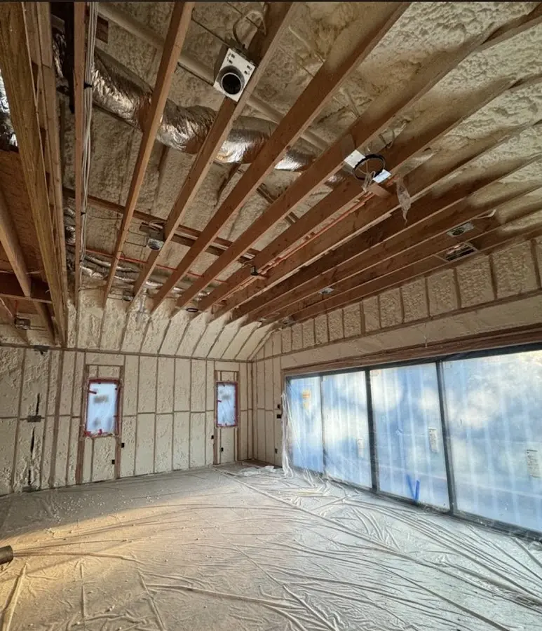 Interior walls and ceiling insulated with spray foam during new construction in Valparaiso
